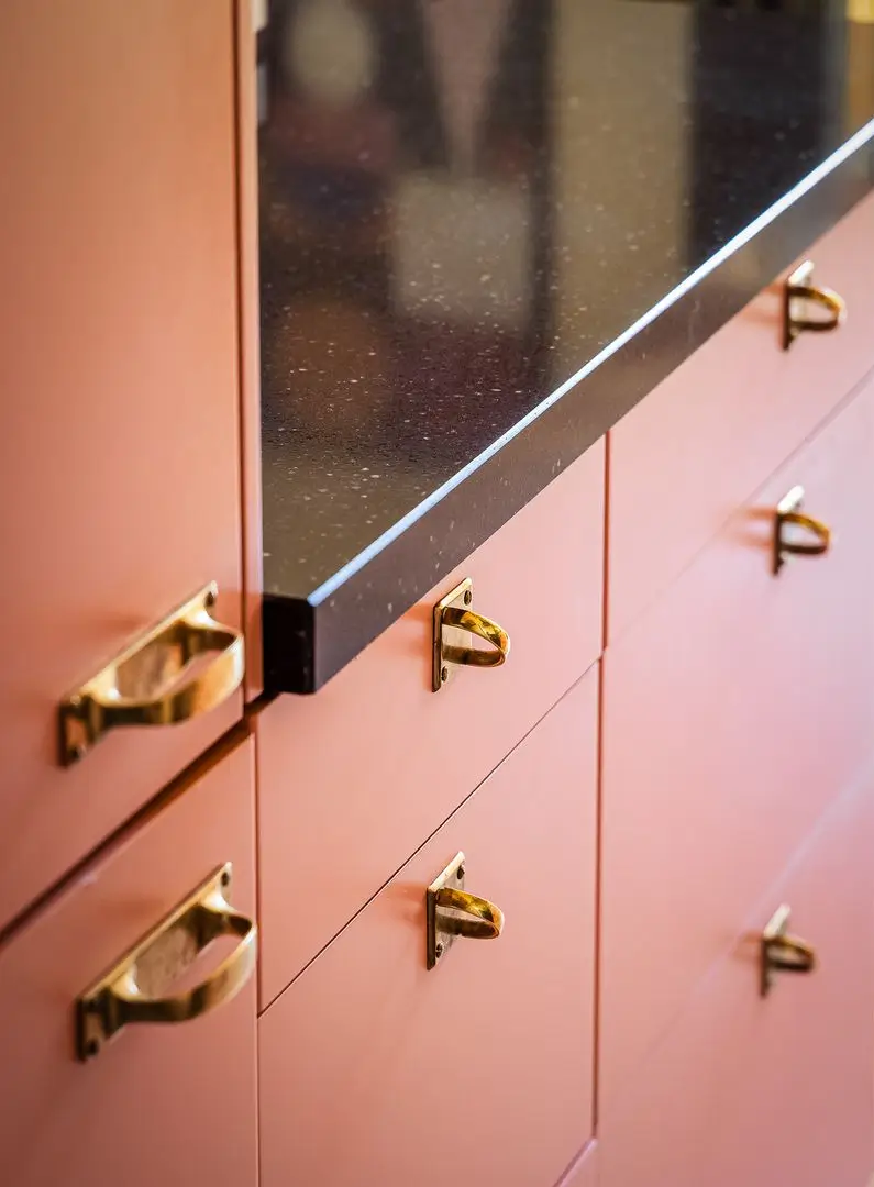 A Pink and Yellow Kitchen in a Colorful Turn-of-the-Century Studio Apartment 8 stockholm-studio-apartment-pink-yellow-kitchen-nordroom