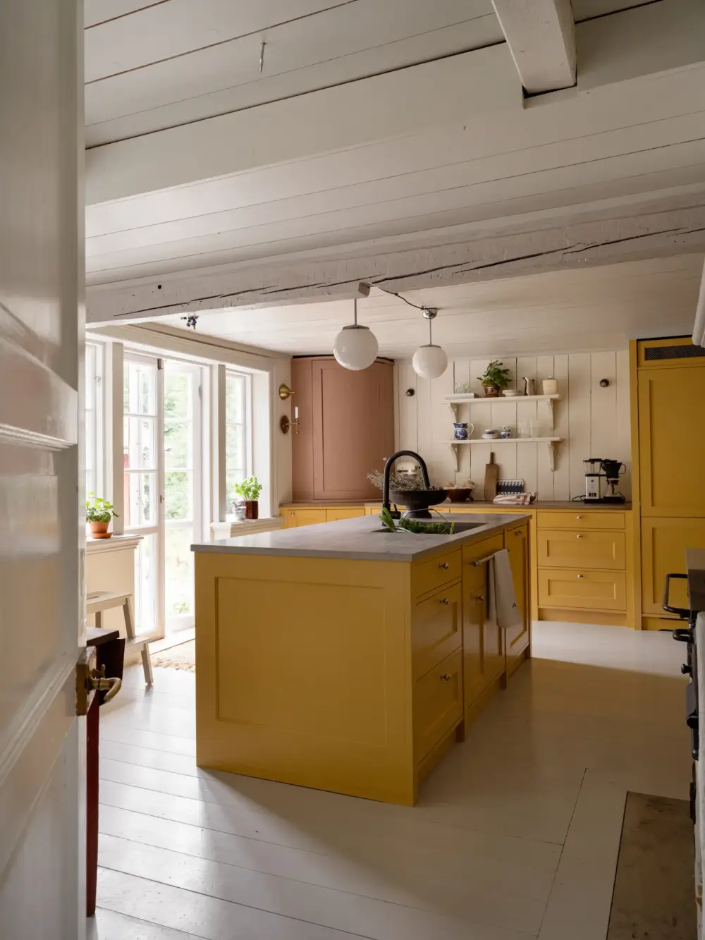 A Yellow Kitchen and Colorful Joinery in a Carefully Restored 1856 Swedish Country House 7 yellow-kitchen-historic-character-renovated-19th-century-home-sweden