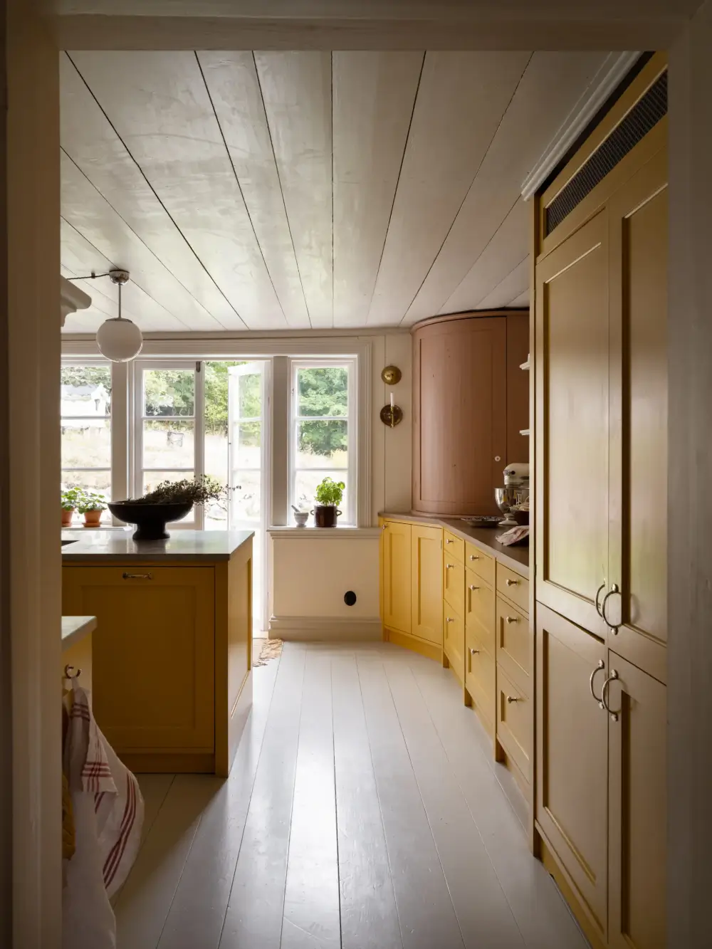A Yellow Kitchen and Colorful Joinery in a Carefully Restored 1856 Swedish Country House 15 yellow-kitchen-historic-character-renovated-19th-century-home-sweden