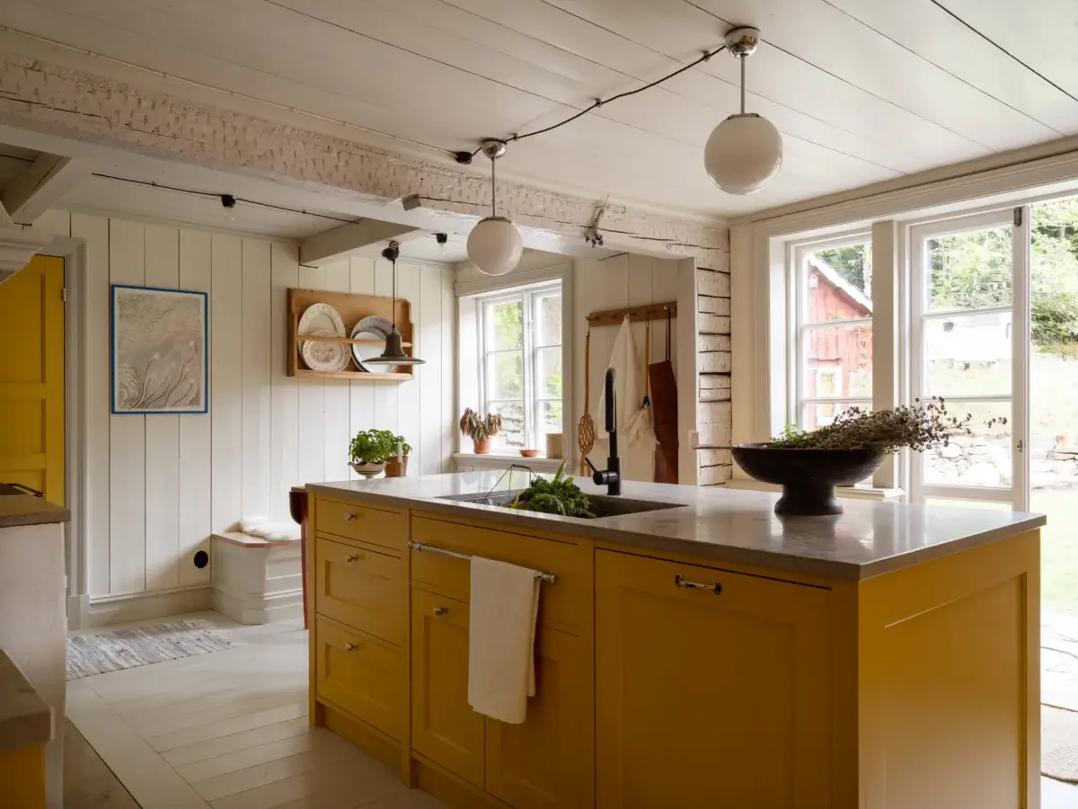 A Yellow Kitchen and Colorful Joinery in a Carefully Restored 1856 Swedish Country House 8 yellow-kitchen-historic-character-renovated-19th-century-home-sweden