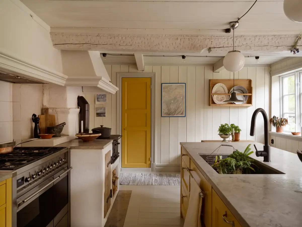 A Yellow Kitchen and Colorful Joinery in a Carefully Restored 1856 Swedish Country House 9 yellow-kitchen-historic-character-renovated-19th-century-home-sweden