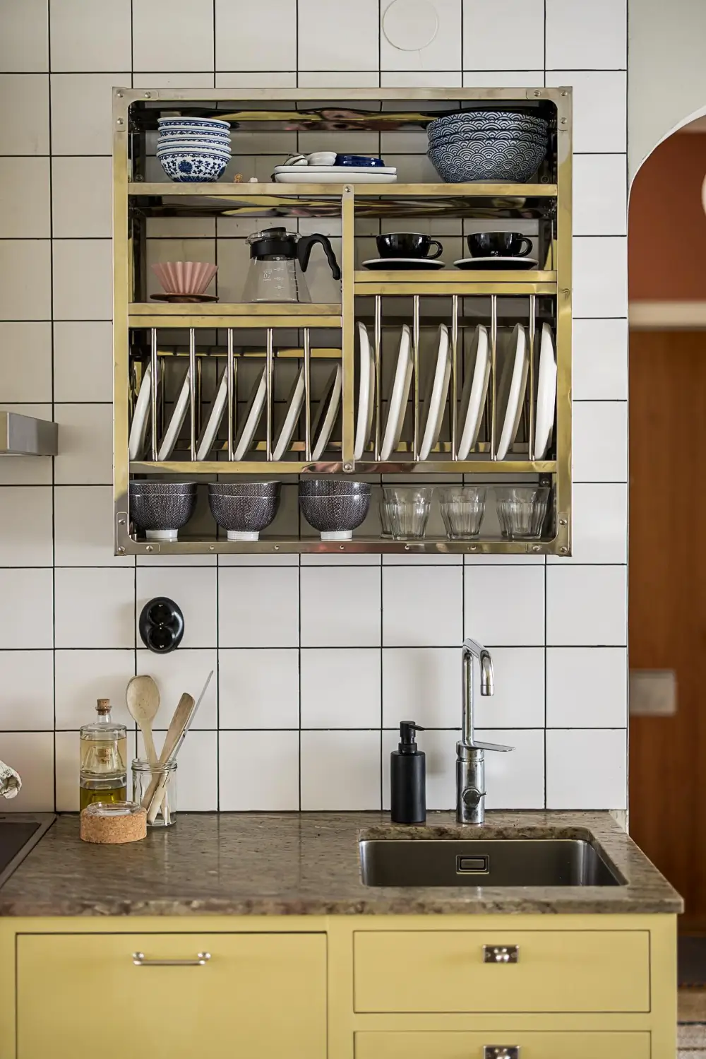 Original Features in a Colorful Midcentury Apartment in Sweden 15 yellow-kitchen-original-features-1940s-apartment-nordroom