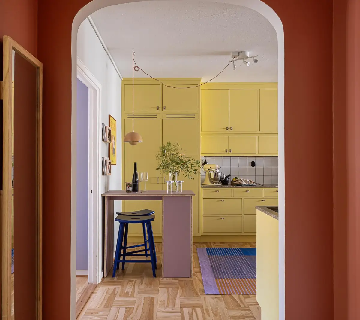 Original Features in a Colorful Midcentury Apartment in Sweden 17 yellow-kitchen-original-features-1940s-apartment-nordroom