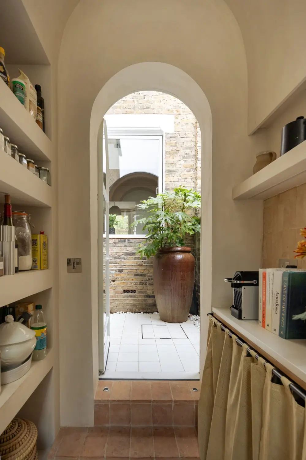 Arched Shapes, Period Details, and Color for a Victorian Family Home 32 arched-forms-light-filled-extended-19th-century-home-london
