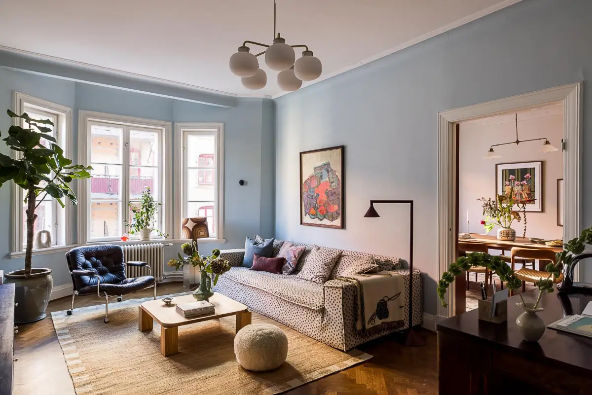Before & After: A Warm Color Palette and Built-In Bookshelves for a Swedish Home 1 before-and-after-warm-cohesive-color-palette-renovated-turn-of-the-century-apartment-nordroom