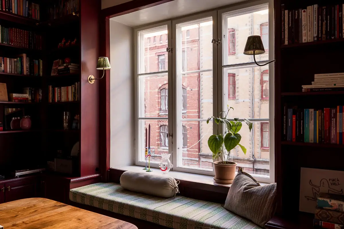 Before & After: A Warm Color Palette and Built-In Bookshelves for a Swedish Home 15 before-and-after-warm-cohesive-color-palette-renovated-turn-of-the-century-apartment-nordroom