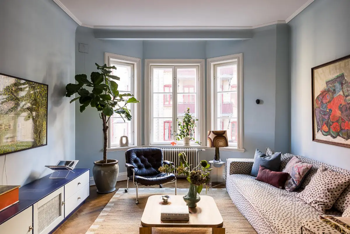 Before & After: A Warm Color Palette and Built-In Bookshelves for a Swedish Home 2 before-and-after-warm-cohesive-color-palette-renovated-turn-of-the-century-apartment-nordroom