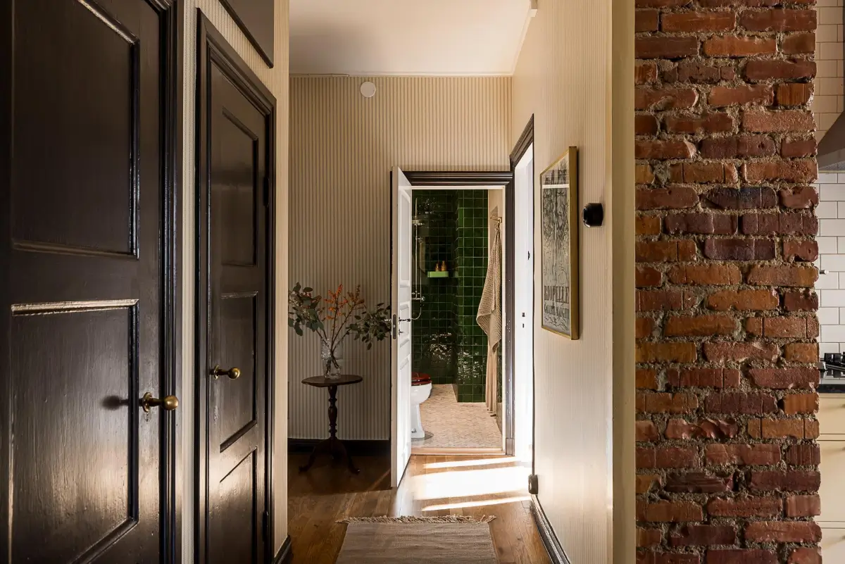 Before & After: A Warm Color Palette and Built-In Bookshelves for a Swedish Home 43 before-and-after-warm-cohesive-color-palette-renovated-turn-of-the-century-apartment-nordroom