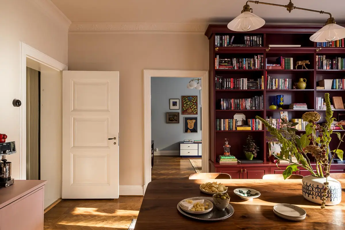 Before & After: A Warm Color Palette and Built-In Bookshelves for a Swedish Home 18 before-and-after-warm-cohesive-color-palette-renovated-turn-of-the-century-apartment-nordroom