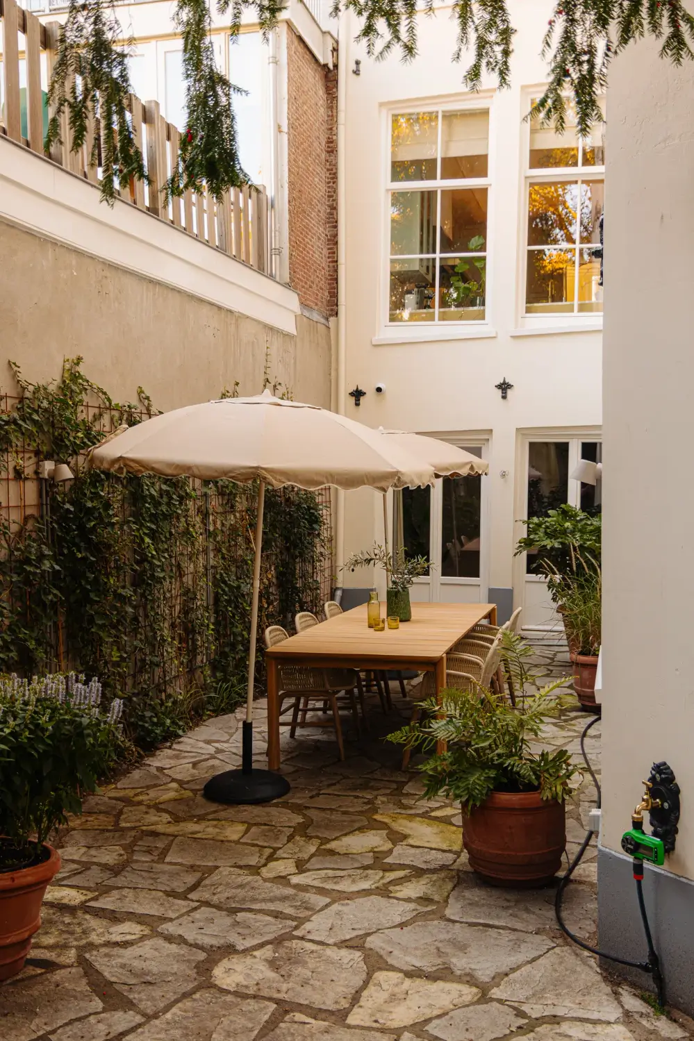 A Classic Amsterdam Canal House with a Light Blue Kitchen and a Secluded Garden 22 luxurious-canal-house-amsterdam