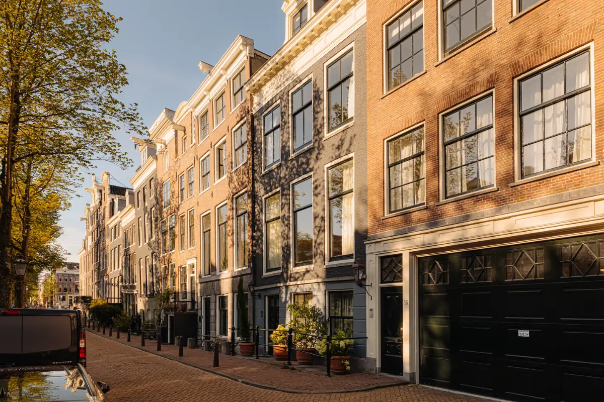 A Classic Amsterdam Canal House with a Light Blue Kitchen and a Secluded Garden 1 luxurious-canal-house-amsterdam