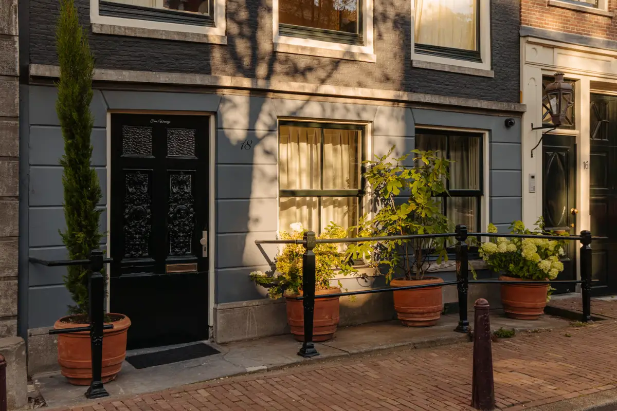 A Classic Amsterdam Canal House with a Light Blue Kitchen and a Secluded Garden 2 luxurious-canal-house-amsterdam